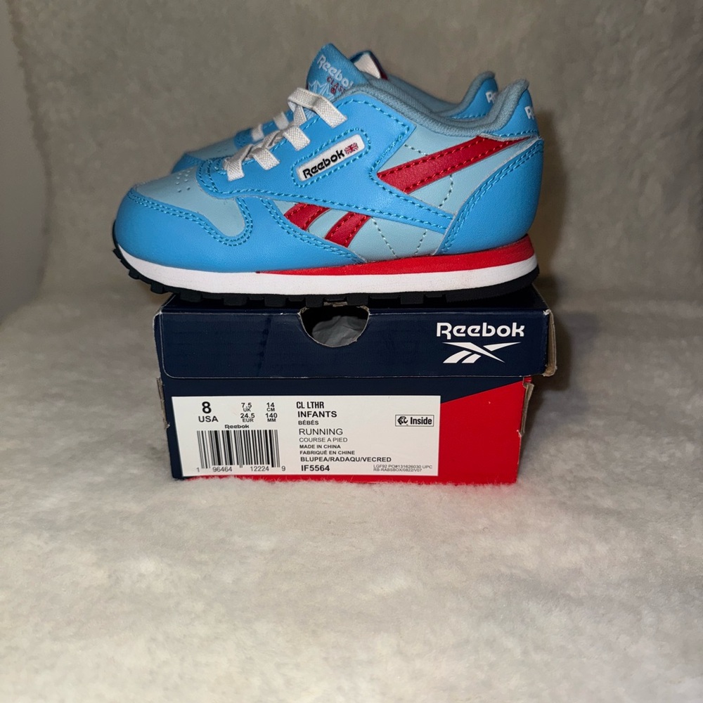 Brand New Reebok Kids Blue and Red Sneakers size 8C.